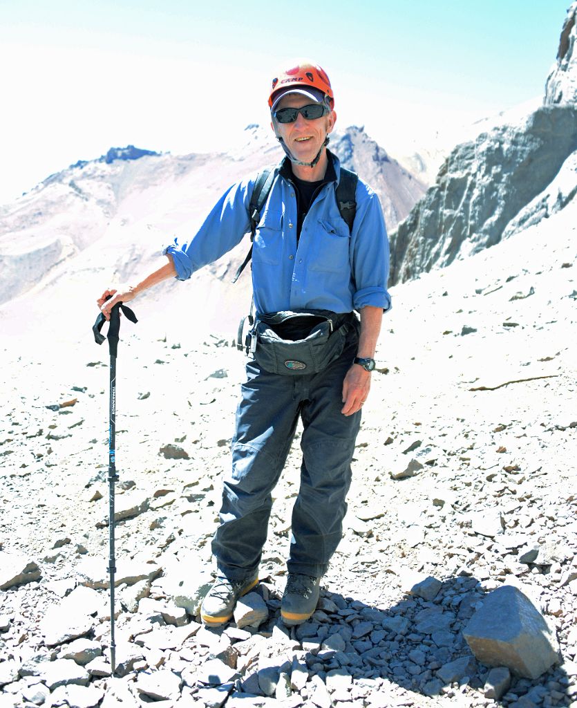 05 Jerome Ryan Put On His Helmet In A Rockfall Area In Warm 15C Weather On The Climb From Plaza Argentina Base Camp To Camp 1